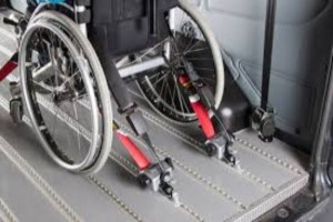 Wheelchair restraining systems